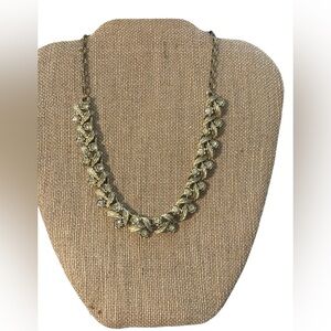 Vintage Coro gold toned leaf and rhinestone bib choker necklace. 17”